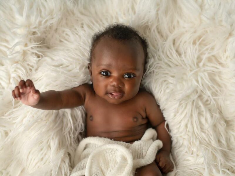 Experienced Newborn Photographer Creating Timeless and Safe Memories of Your Precious Little One