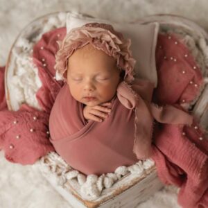 Experienced Newborn Photographer Creating Timeless and Safe Memories of Your Precious Little One