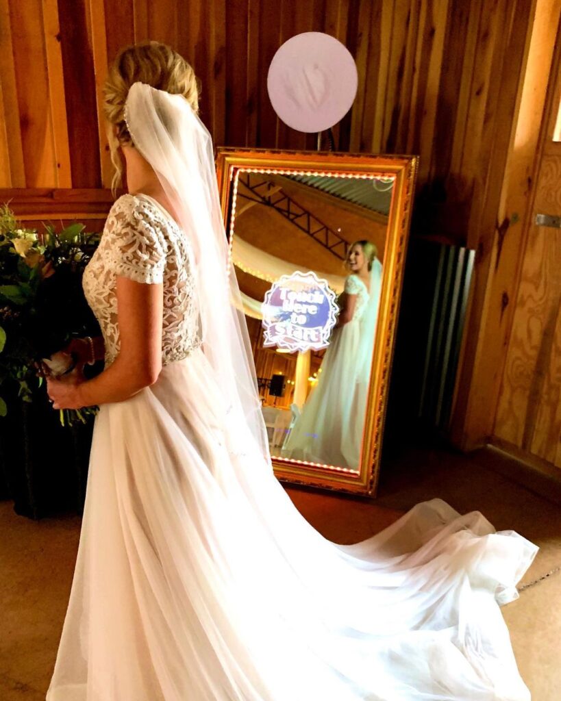 Experience the Future of Photo-Taking with our Interactive Mirror Photobooth - Customizable, User-Friendly, and Unforgettable!