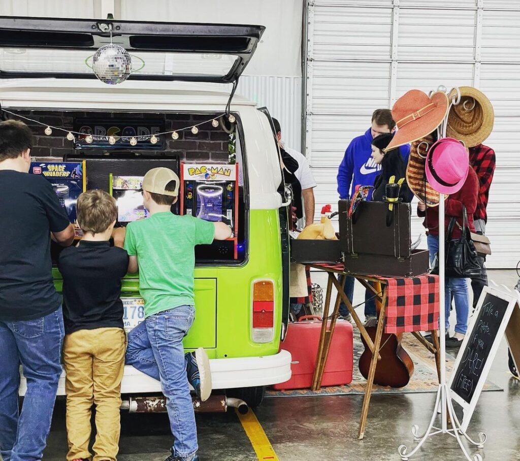 The Ultimate Party Bus Photo Booth: Arcade Games, Instant Prints, and Social Media Sharing! Perfect for Weddings, Proms, Parties, and Corporate Events!