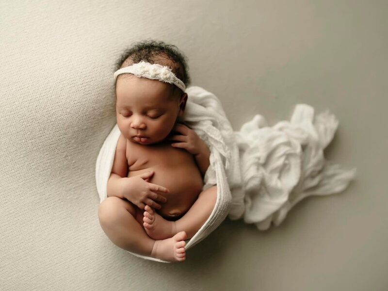 Artistic Newborn & Family Portraits: Relax and Let Us Do the Work! 13 Years of Experience and a Studio Full of Props for Unique Photos.