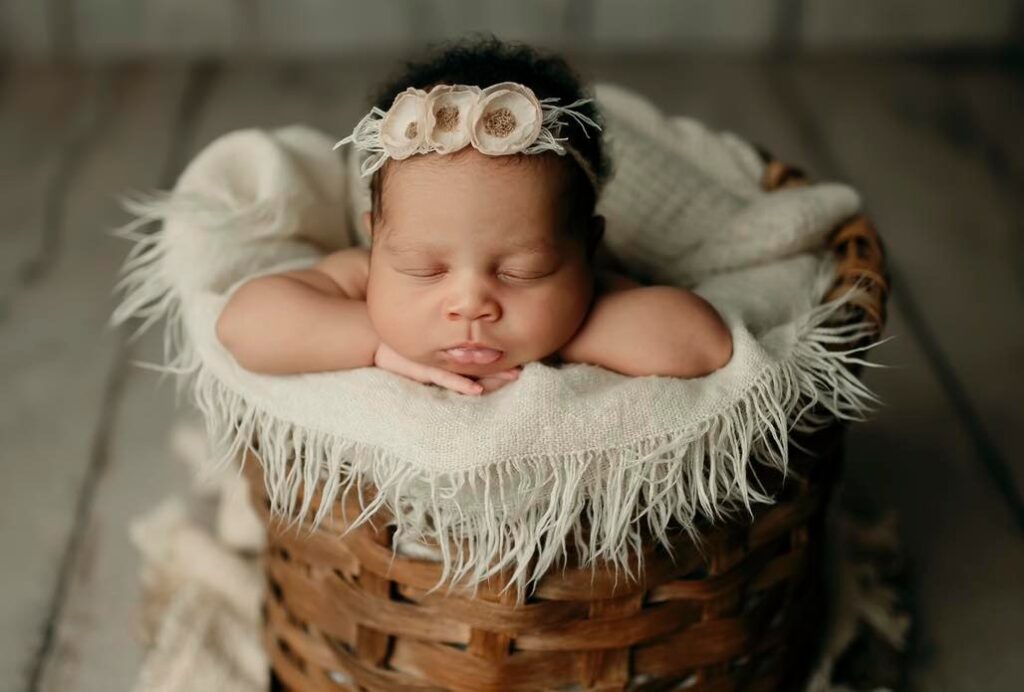 Artistic Newborn & Family Portraits: Relax and Let Us Do the Work! 13 Years of Experience and a Studio Full of Props for Unique Photos.