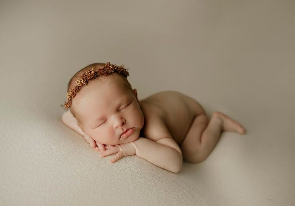 Artistic Newborn & Family Portraits: Relax and Let Us Do the Work! 13 Years of Experience and a Studio Full of Props for Unique Photos.