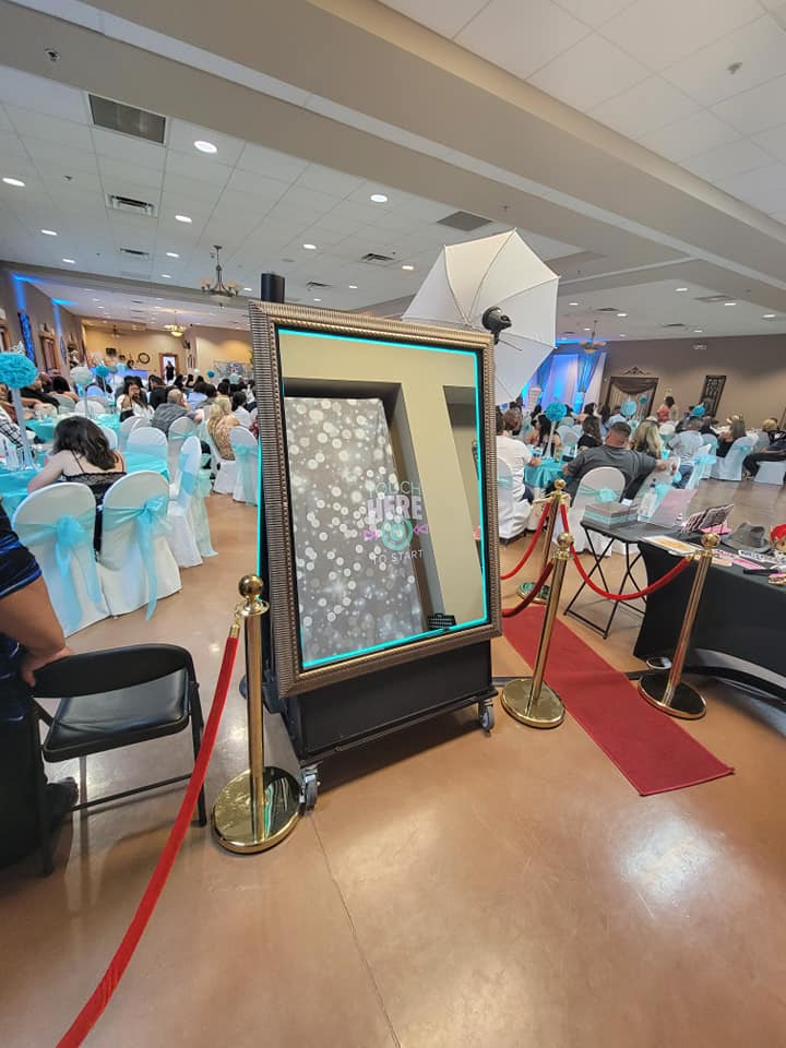 Strike a pose and capture the memories with our Mirror Photobooth!