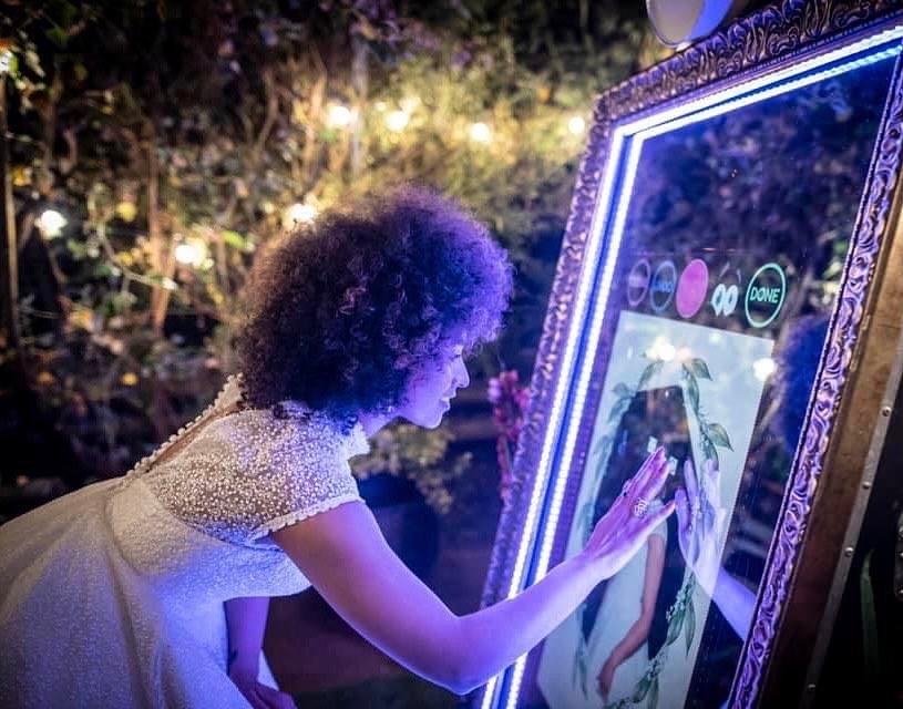 Transform Your Event with an Interactive Mirror Photo Booth Experience: Customizable Features and Keepsake Photos!