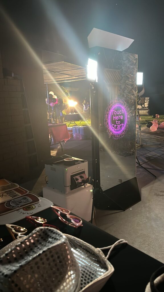 Step into Your Reflection: Rent Our 6-Foot Mirror X Photobooth with Touchscreen and Customized Animations for Your Next Party!