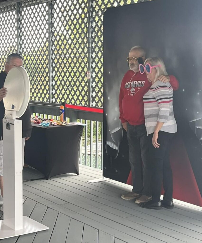 THE LOOKING GLASS PHOTO BOOTH