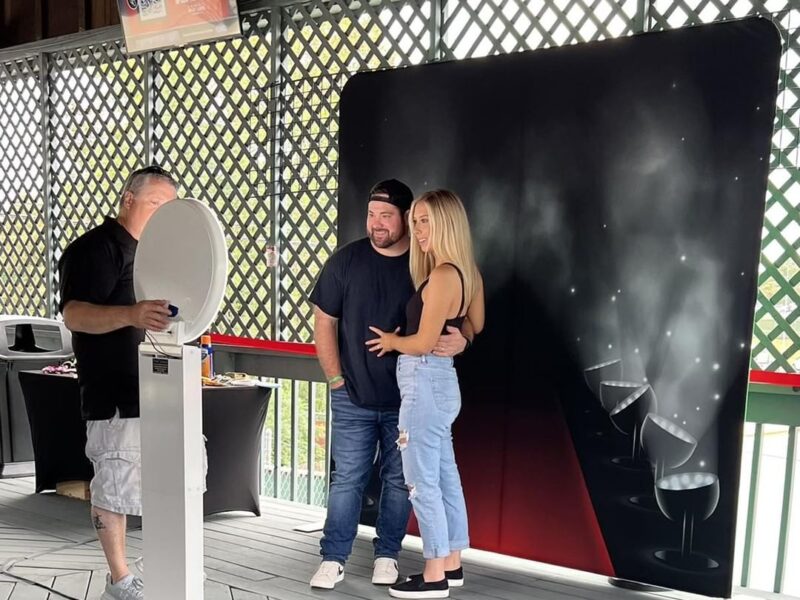 THE LOOKING GLASS PHOTO BOOTH
