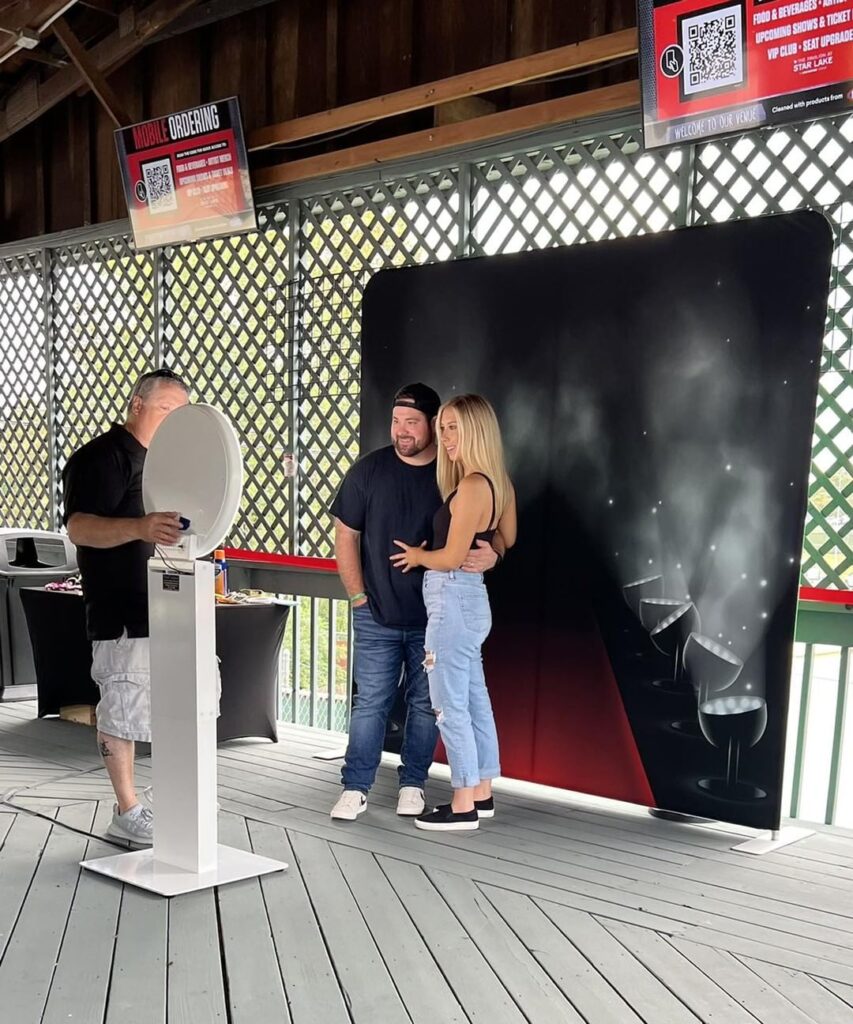 THE LOOKING GLASS PHOTO BOOTH