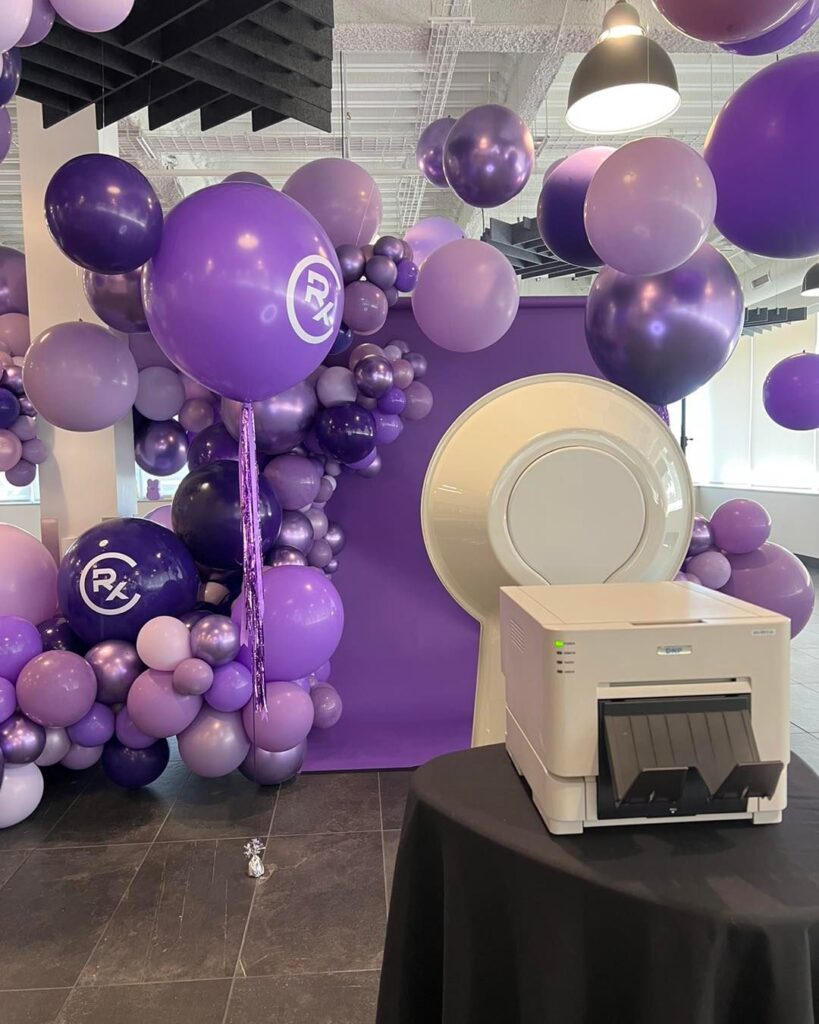 THE LOOKING GLASS PHOTO BOOTH