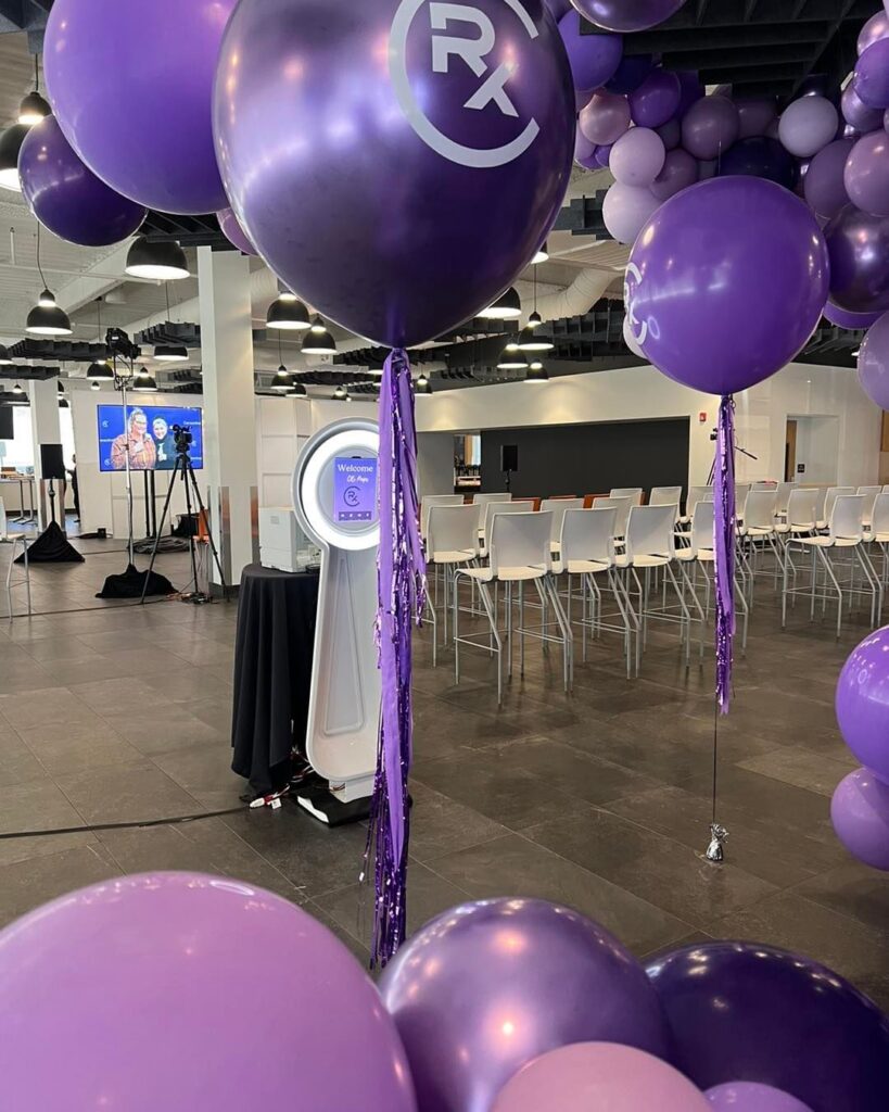 THE LOOKING GLASS PHOTO BOOTH