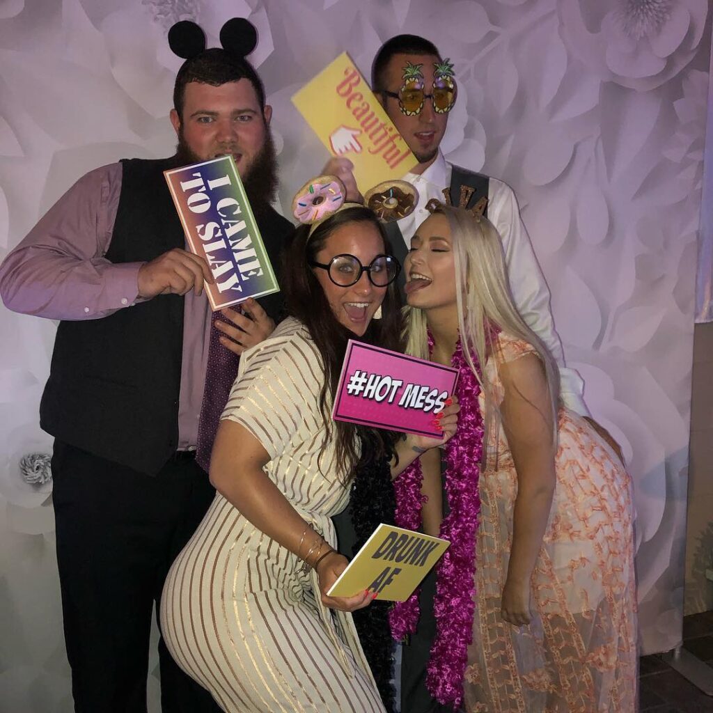 THE LOOKING GLASS PHOTO BOOTH