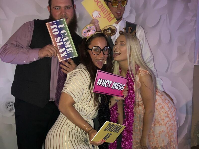 THE LOOKING GLASS PHOTO BOOTH