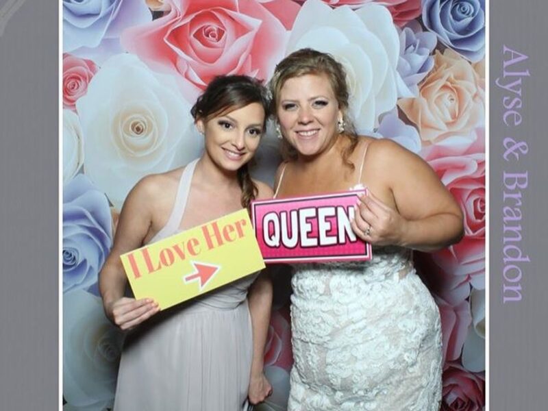 THE LOOKING GLASS PHOTO BOOTH