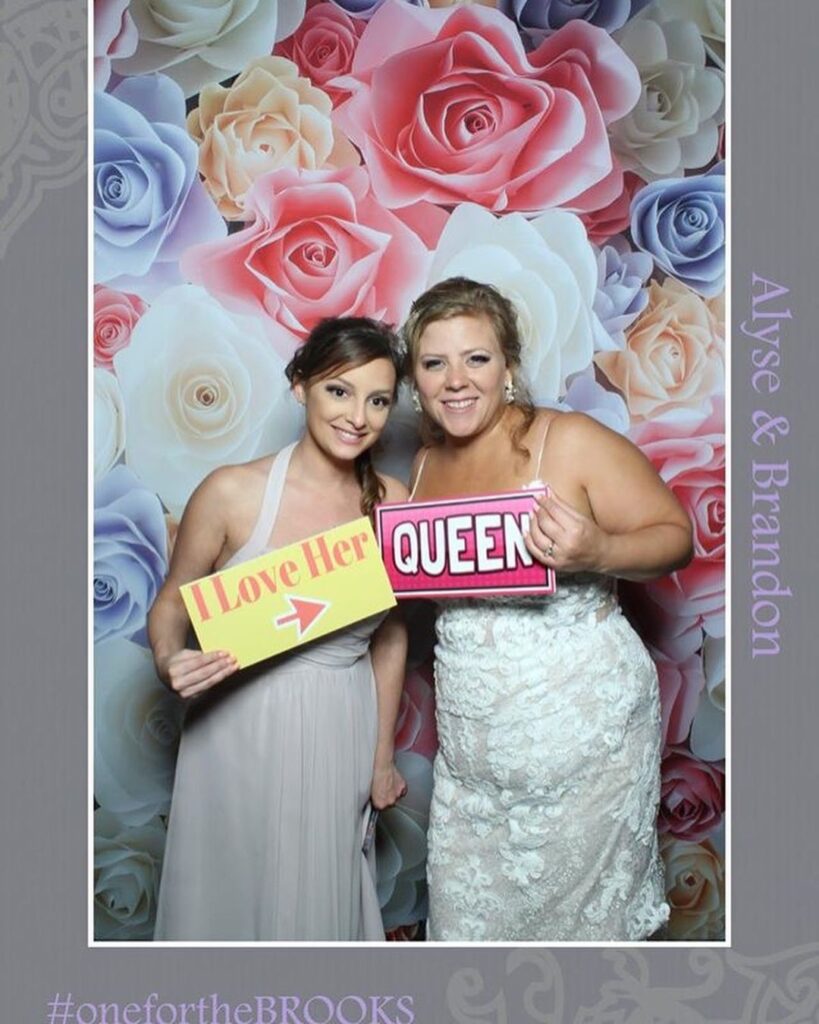 THE LOOKING GLASS PHOTO BOOTH