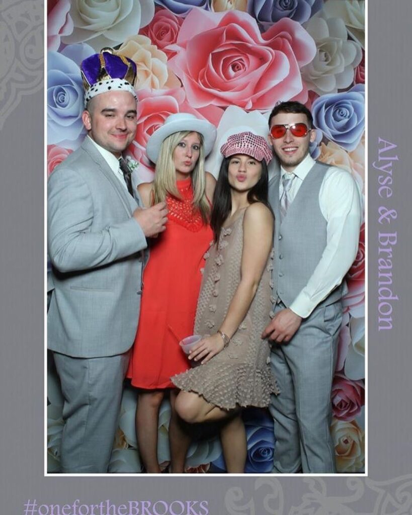 THE LOOKING GLASS PHOTO BOOTH