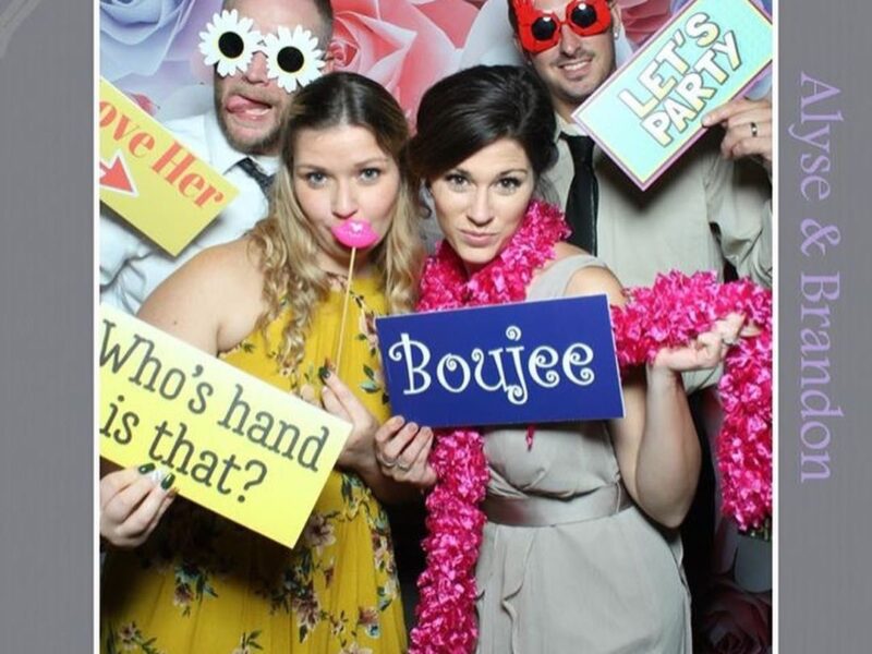 THE LOOKING GLASS PHOTO BOOTH
