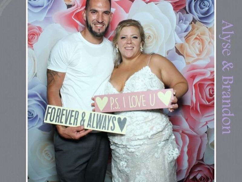 THE LOOKING GLASS PHOTO BOOTH