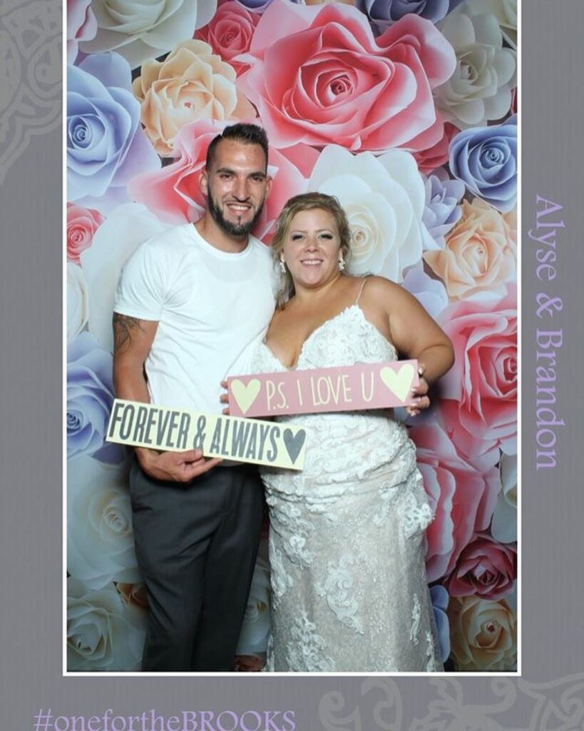 THE LOOKING GLASS PHOTO BOOTH