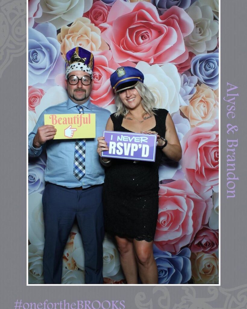 THE LOOKING GLASS PHOTO BOOTH